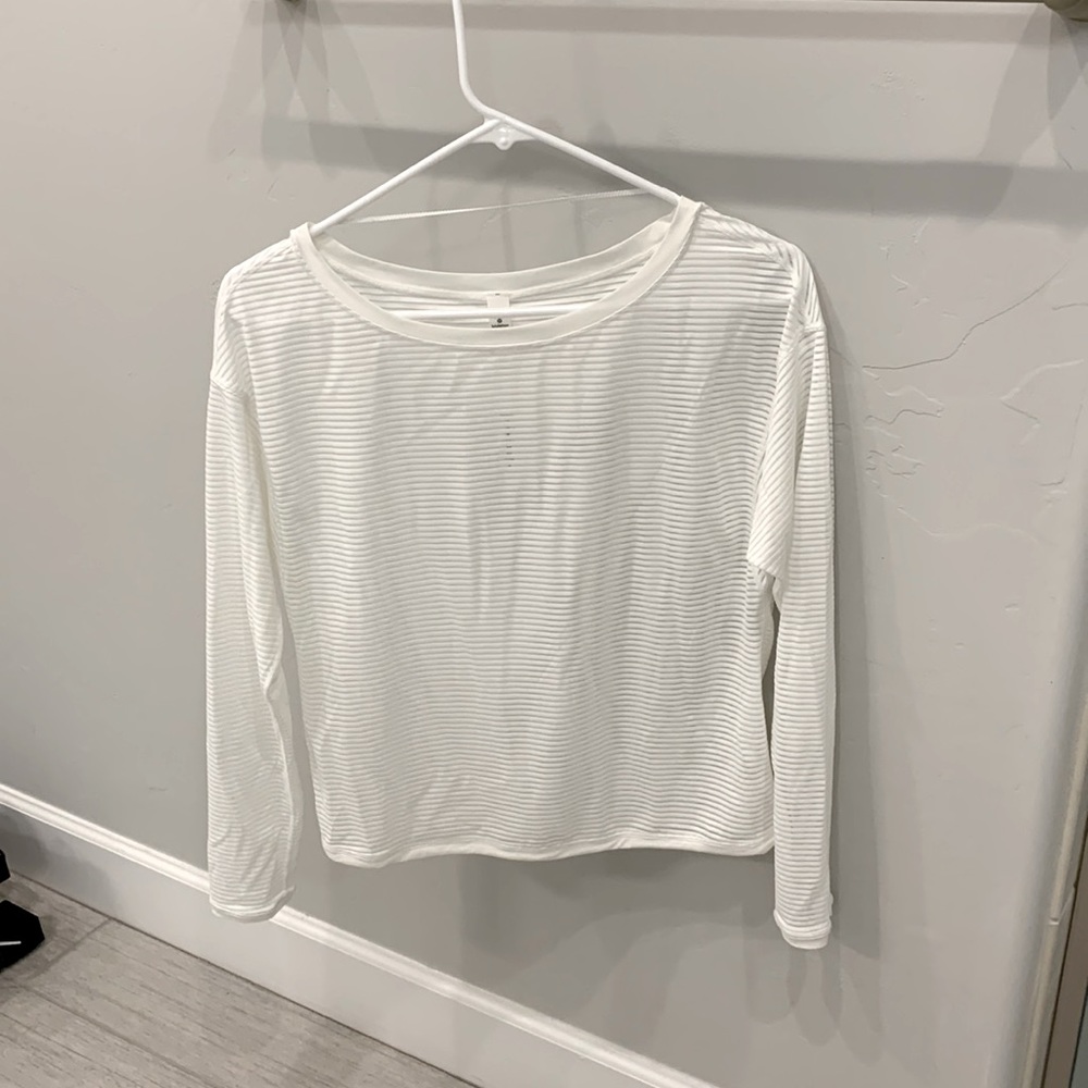 Lululemon Size 2 white long sleeve top. Worn twice.
